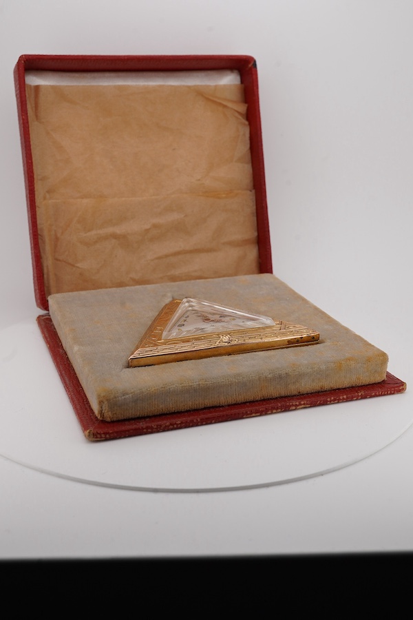 A cased gold plated Minimax Masonic triangular pocket watch, with symbol 'numerals', 48mm by 55mm. Condition - poor to fair